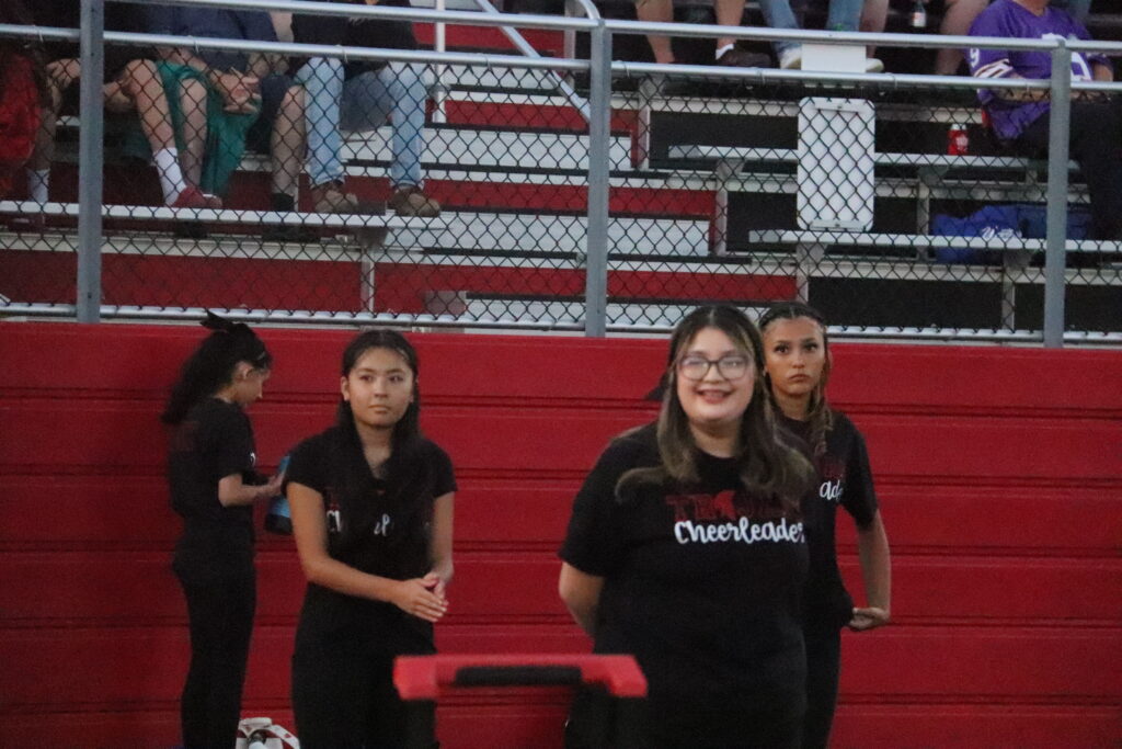 Cheerleading at football game.