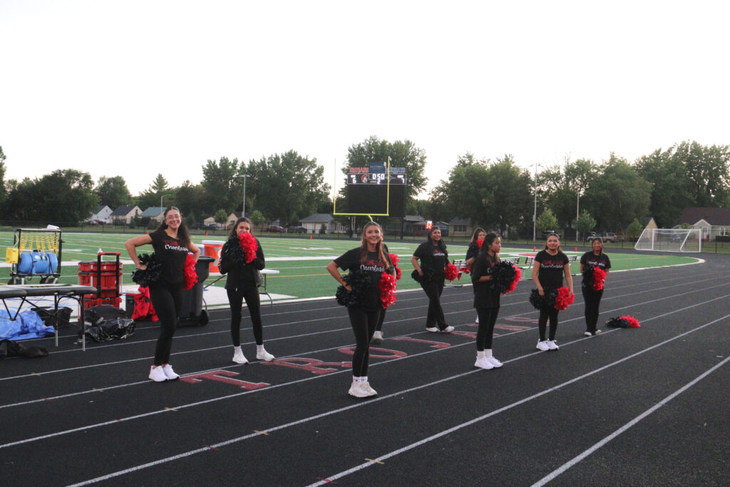 Cheerleading at football game.